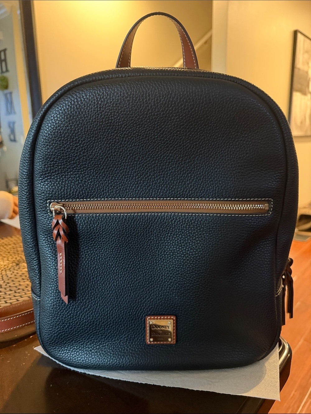 Dooney & Bourke Black Pebbled Leather Backpack with Tan Accents